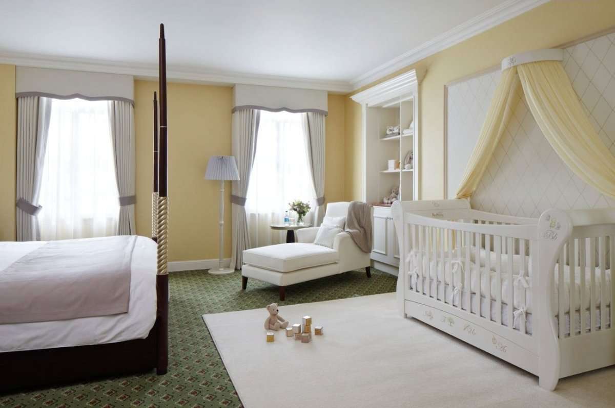 photo of a bedroom with a crib