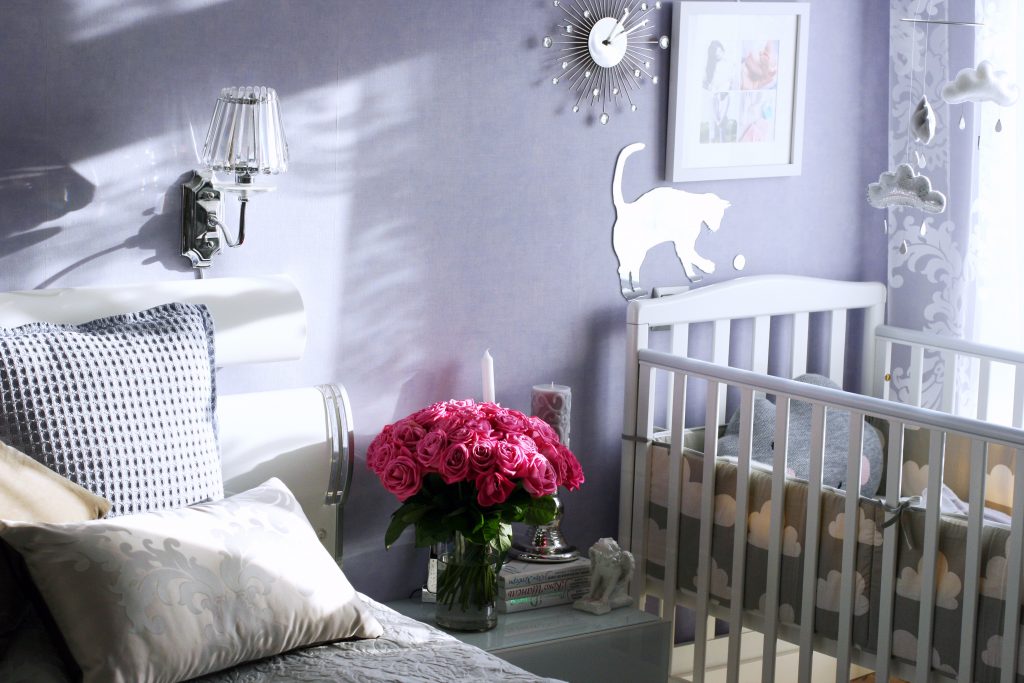 bedroom decor with crib