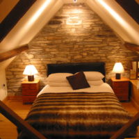 bedroom in a wooden house without windows