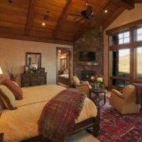 bedroom in a wooden house spotlights