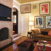 Cozy living room with paintings over the sofa