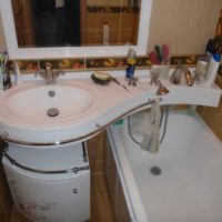 Sink above the bathroom in the combined bathroom