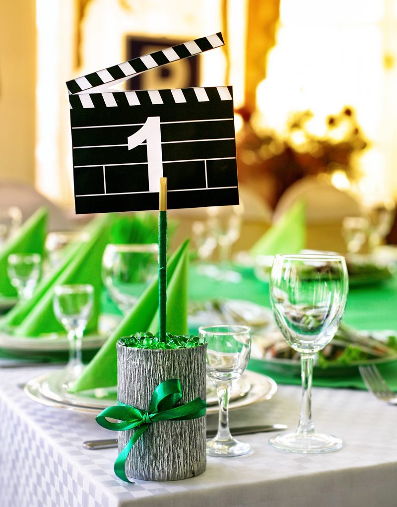 Clapper board plate on guest table