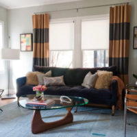 Striped curtains on the window in a modern living room