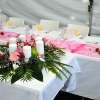 Table for candles in front of the bride and groom