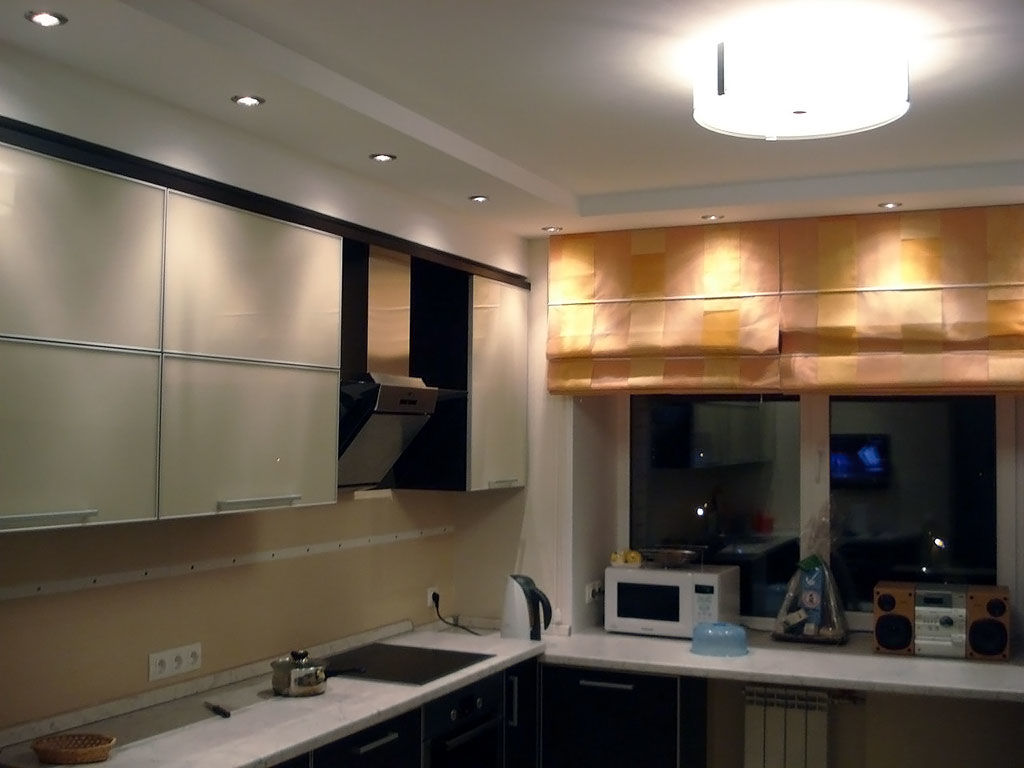 An example of a bright kitchen ceiling interior