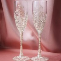 example of a beautiful decoration of the style of wedding glasses photo