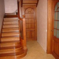 an example of a bright interior staircase in an honest house picture