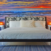 Sea shore and sunset on the mural in the bedroom