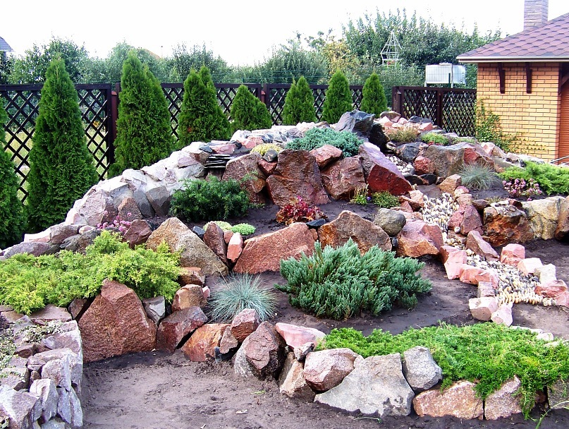 Alpine hill in landscaping of a seasonal dacha