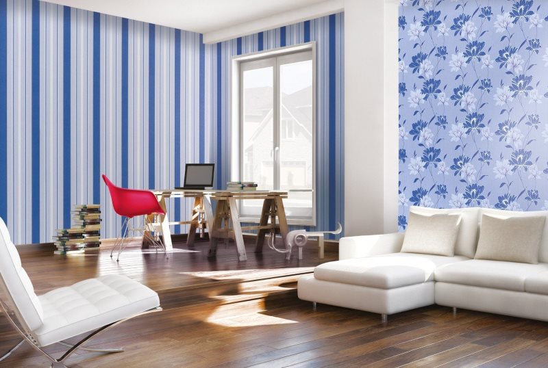 Stripes and floral wallpaper pattern in the living room of a country house.