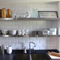 Brickwork behind the kitchen shelves