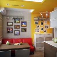 Yellow color in the interior of the kitchen-living room