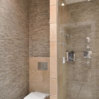 Tile brown in the decoration of the bathroom of a studio apartment