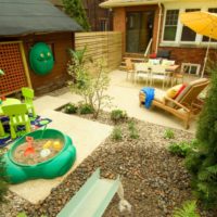 Patio with playground and sitting area