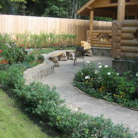 Winding path to a wooden arbor