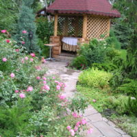 Wooden arbor in the back of the garden