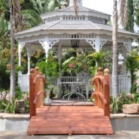 Beautiful gazebo and bridge over an artificial pond