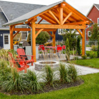 Wooden arbor in landscaping