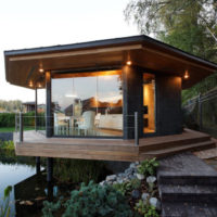 Lighting in the gazebo on the shore of the pond