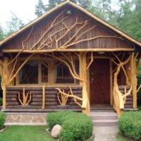 Decorating an open terrace with tree trunks