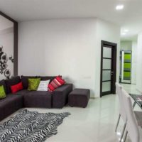 Bright pillows in the interior of a studio apartment