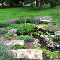 A place to relax on the shore of the pond