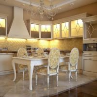 Illumination of an apron and cabinets in the kitchen of a private house