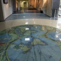 Vintage world map on living room floor