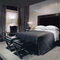 Leather poufs in the dark bedroom