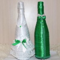 Green and white bottles for a wedding