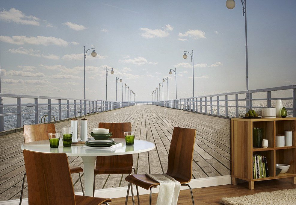 Wall in the kitchen with murals with the image of the sea pier