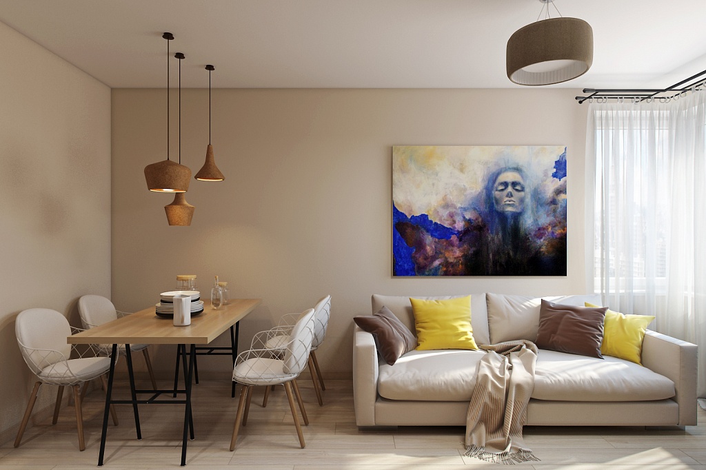 Dining area and sofa in the interior of a studio apartment of 37 squares