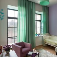 Mint curtains and a lilac chair in the room of a country house