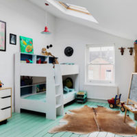 Mint color wooden floor in the nursery