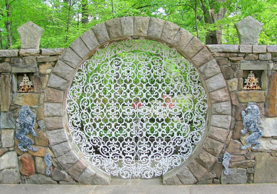 Beautiful stone fence with forged elements