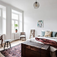 Interior of a bright bedroom in country style