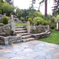 Natural stone terraces on a slope