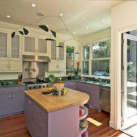 Lavender facades of a kitchen set in the kitchen in the country