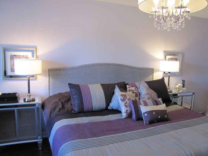 Lavender-colored bedroom interior with gray accents