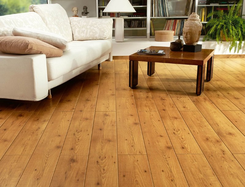 Linoleum with imitation of a wooden floor in the interior of the living room