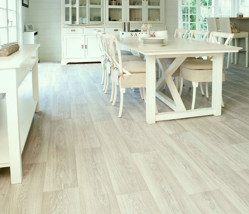 The interior of the kitchen-living room with linoleum under a clarified oak