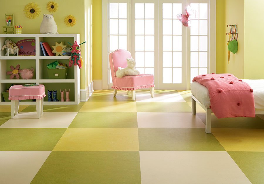 Linoleum with bright colors in the interior of a child’s room for a girl