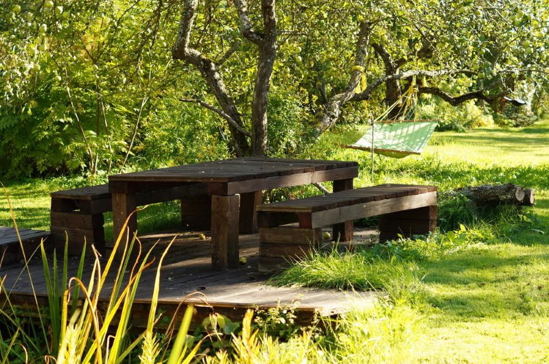 Rest area in the shade of garden trees