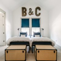 Dark letters on a light bedroom wall