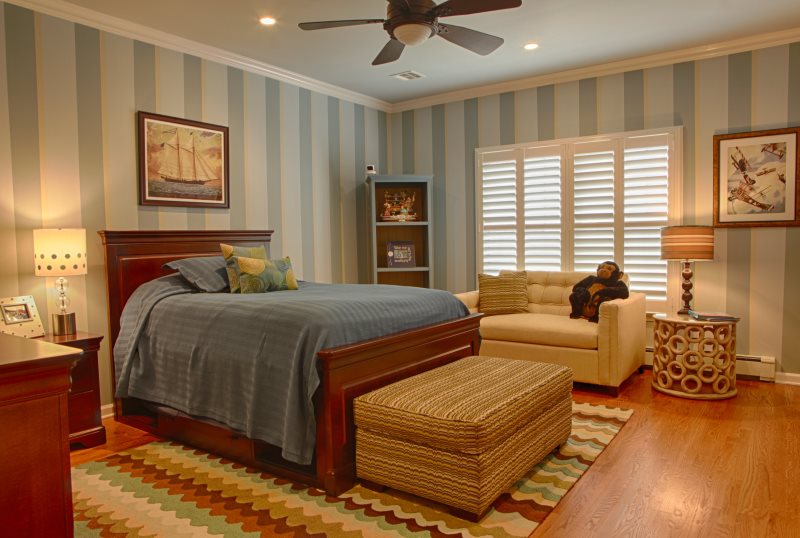 Striped rustic bedroom interior