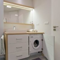 Built-in washing machine next to the sink