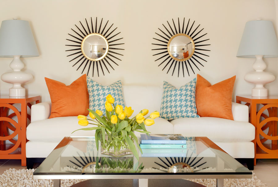 Orange pillows on sofa in living room interior