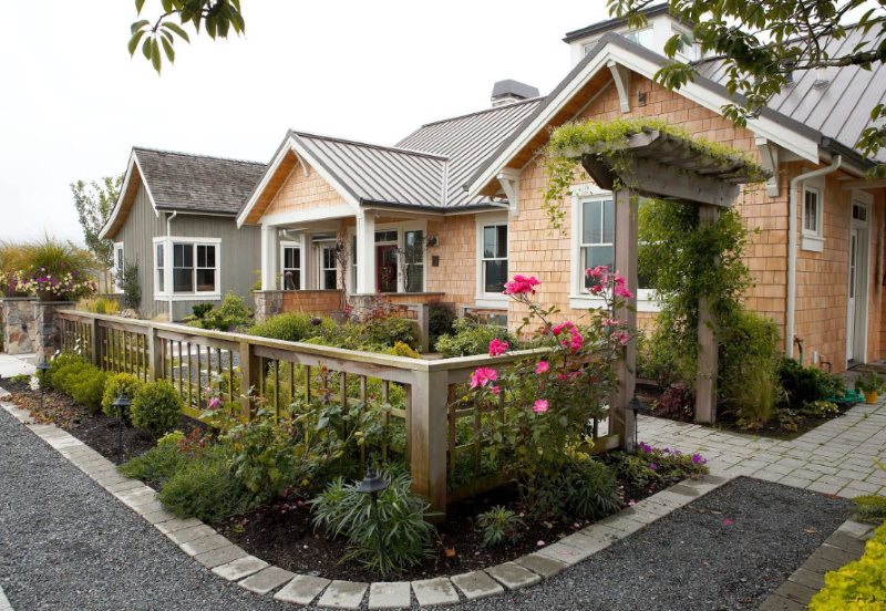 Beautiful front garden in front of the windows of a country house