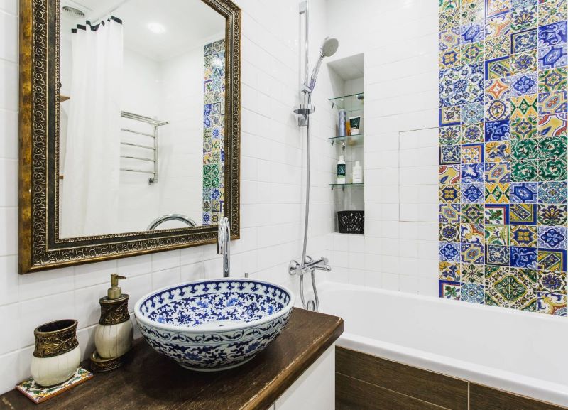 Mosaic mural on the wall in a Mediterranean style bathroom